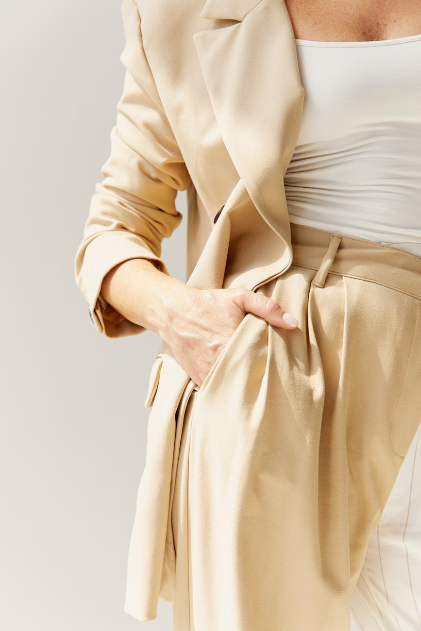 woman in beige blazer and slocks